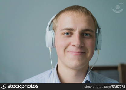 Man listening to music on smartphone