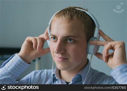 Man listening to music on smartphone