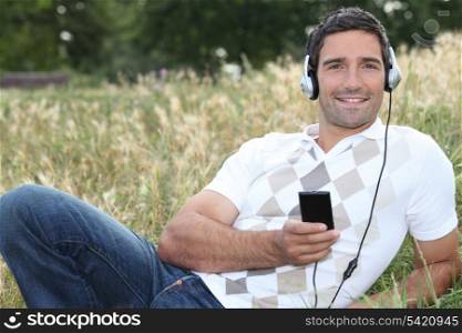 Man listening to music outdoors