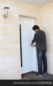 Man locking his door