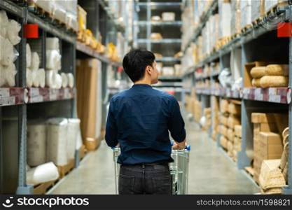 man looking and shopping in the warehouse store