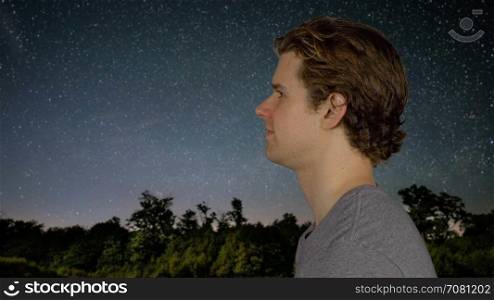 Man looking at the universe