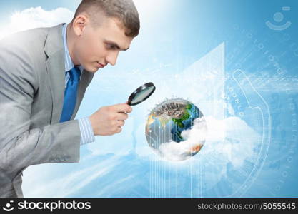 Man looking in magnifier. Image of businessman examining objects with magnifier. Elements of this image are furnished by NASA