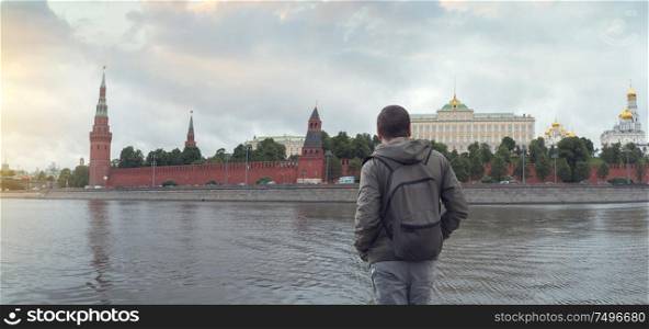 man looks at the Kremlin. Russian Federation