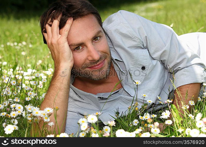 Man lying in a field