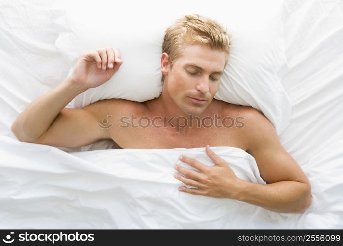 Man lying in bed sleeping