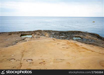 Man made evaporation ponds for salt production, Malta