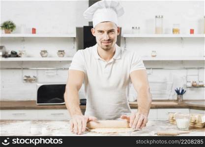 man making pizza dough