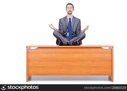 Man meditating on the desk
