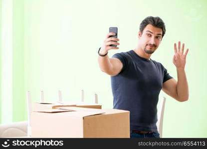 Man moving house with boxes