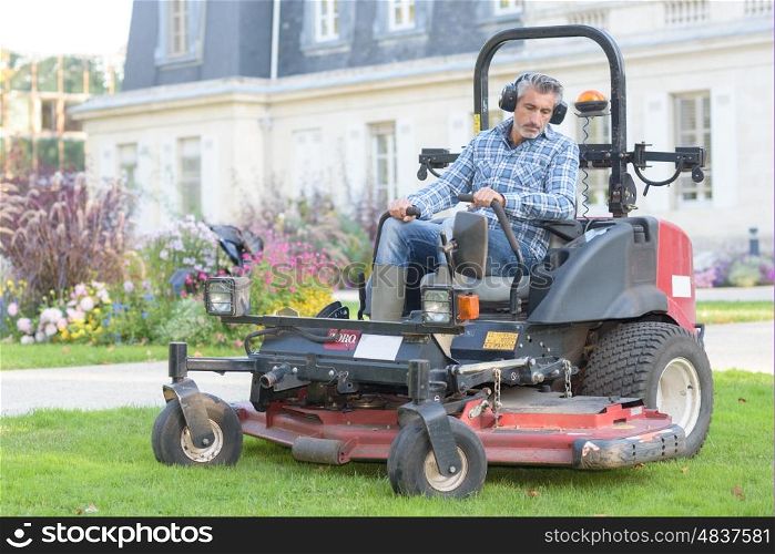 man mowing the garden