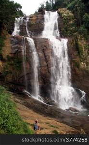 Man near Ramboda falls in Sri Lanka