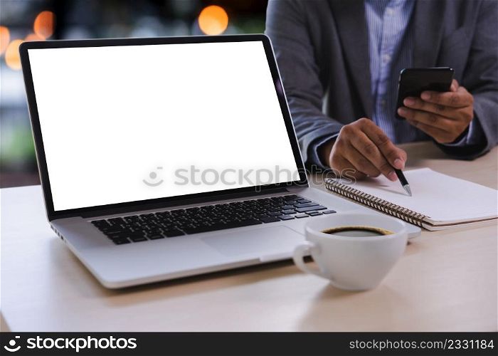man of business man hand working on laptop computer blank white screen laptop on vintage wooden