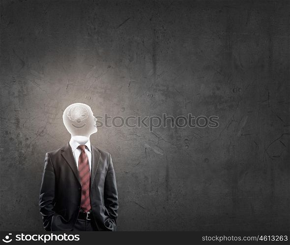 Man of great mind. Businessman in suit with brain instead of head