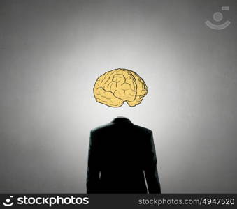 Man of great mind. Businessman in suit with brain instead of head