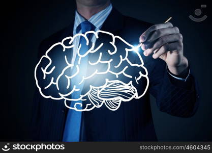 Man of great mind. Chest view of businessman drawing human brain on screen