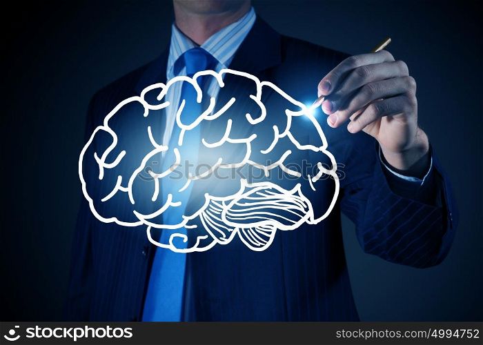 Man of great mind. Chest view of businessman drawing human brain on screen