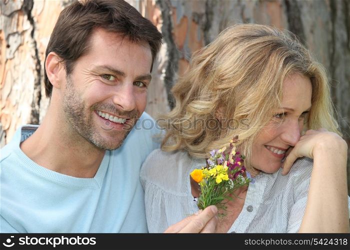 Man offering flowers