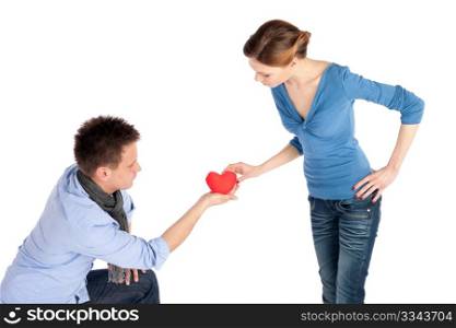 Man offering his heart to beloved woman, isolated over white background.