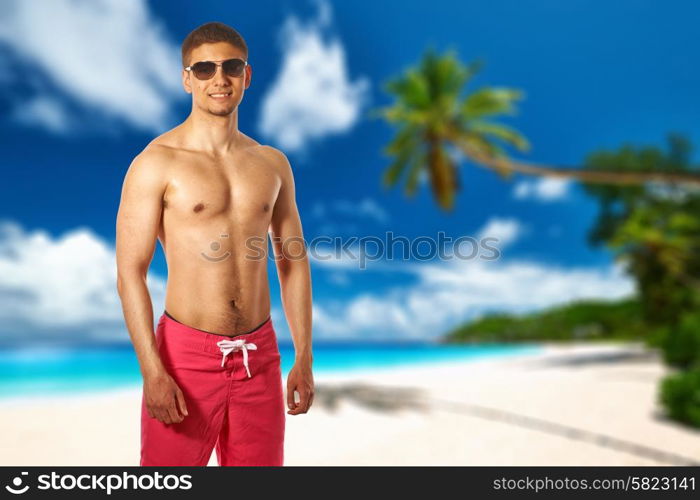 Man on beach Anse Intendance at Seychelles, Mahe. Collage.