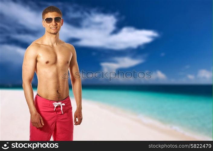 Man on beach at Maldives. Collage.