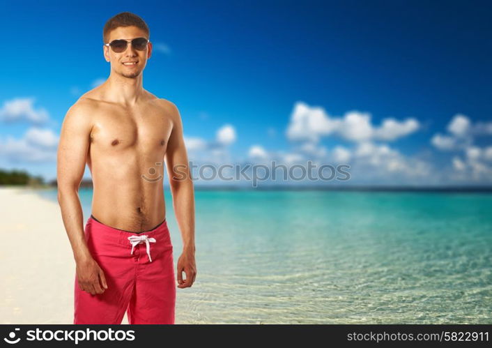 Man on beach at Maldives. Collage.