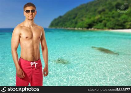 Man on beach at Perhentian islands, Malaysia. Collage.