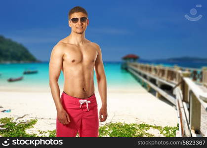 Man on beach at Perhentian islands, Malaysia. Collage.