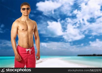 Man on beach with sandspit at Maldives. Collage.