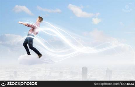 Man on cloud. Young man walking on cloud high in sky