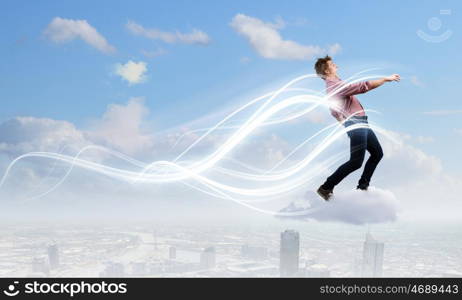 Man on cloud. Young man walking on cloud high in sky