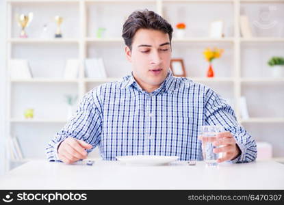 Man on diet waiting for food in restaurant