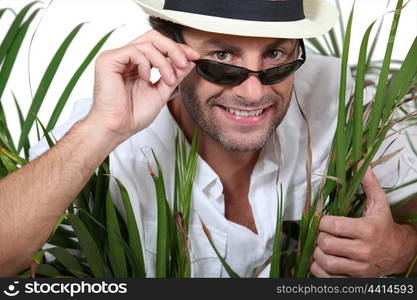 Man on holiday wearing sunglasses