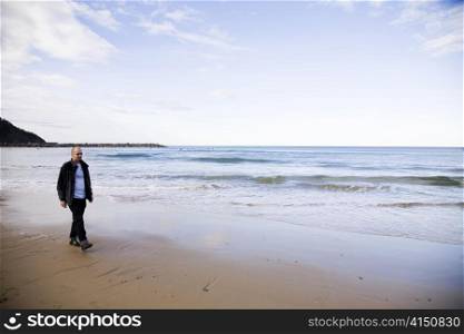 Man On The Beach. San Sebastian. Spain