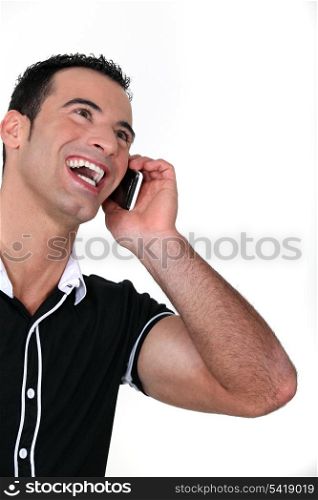 Man on the phone laughing
