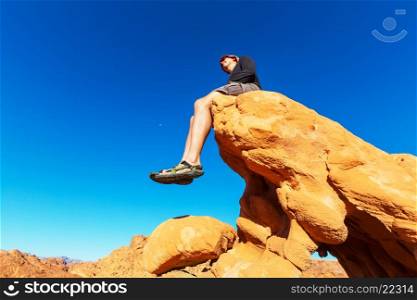 Man on the sheer cliff