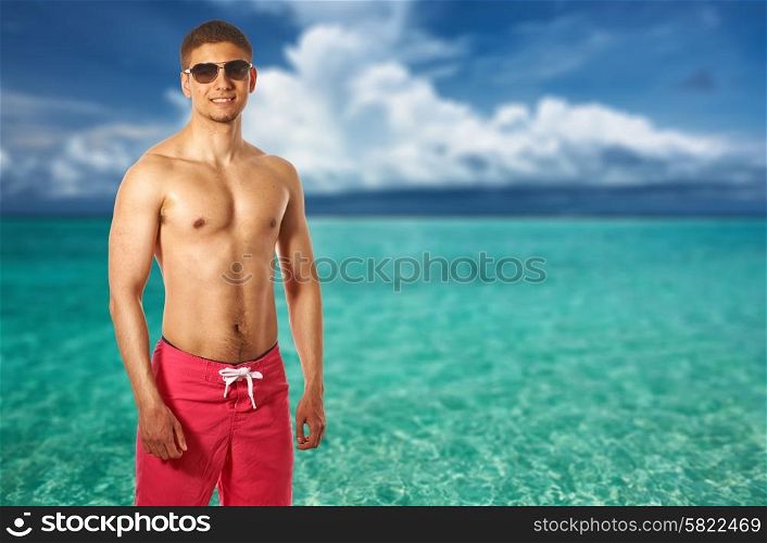 Man on tropical maldivian beach. Collage.