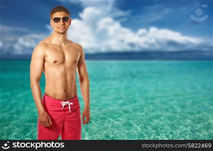 Man on tropical maldivian beach. Collage.