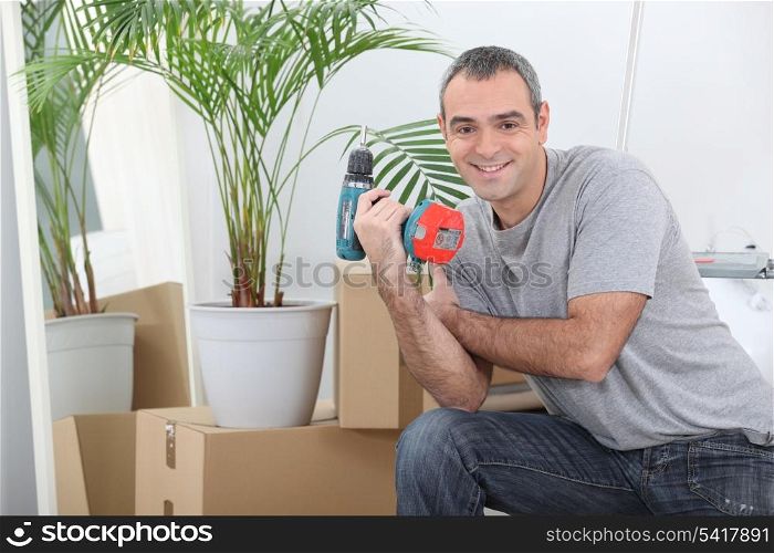 Man packing boxes for house move