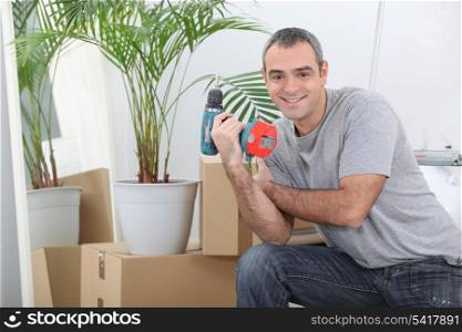 Man packing boxes for house move