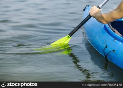 man paddling kayak lake. High resolution photo. man paddling kayak lake. High quality photo