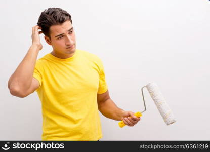 Man painting the wall in DIY concept