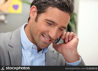 man passing a phone call