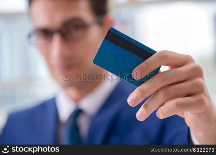 Man paying with credit card online