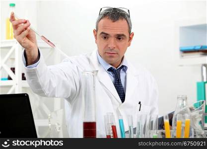 Man performing a chemistry experiment