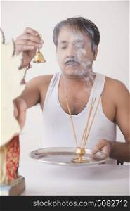Man performing a pooja