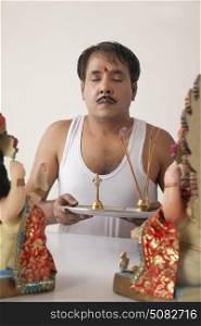 Man performing a pooja