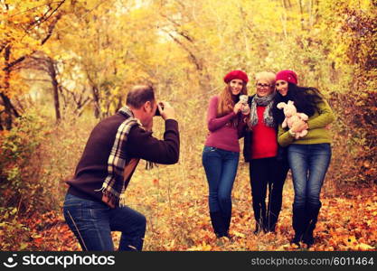 man photographer his family outdoors