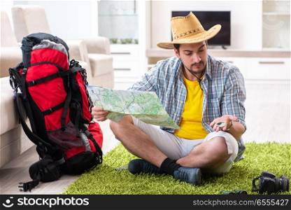 Man planning his travel with map