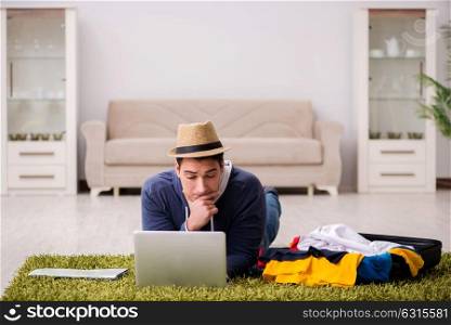 Man planning his vacation trip with map. The man planning his vacation trip with map